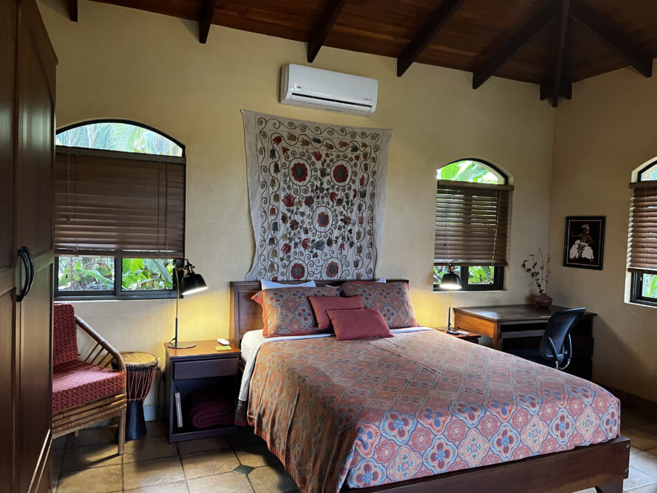 Bedroom with queen bed, AC & ceiling fan