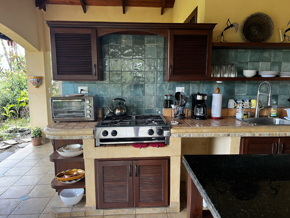 Full outdoor kitchen with view 