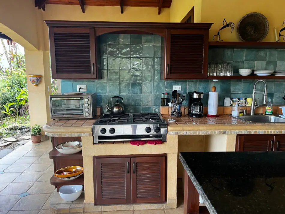 Full outdoor kitchen with view 