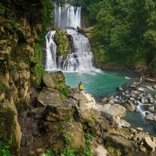 Nauyaca Waterfalls in Costa Rica surrounded by lush rainforest